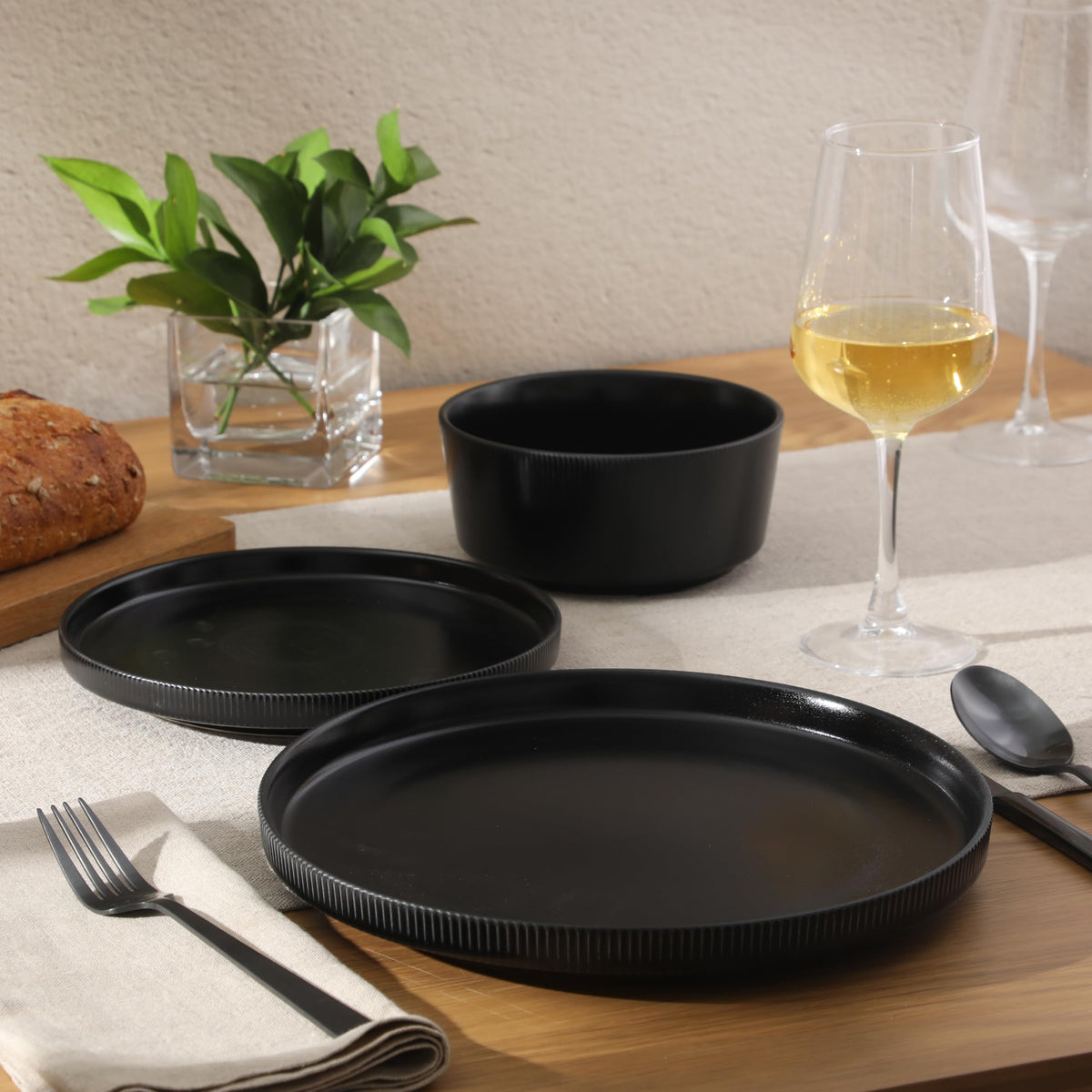 Dempsey Road 12-Piece Stoneware Dinnerware Set - Service for 4, Round Black Plates and Bowls, Durable Solid Color