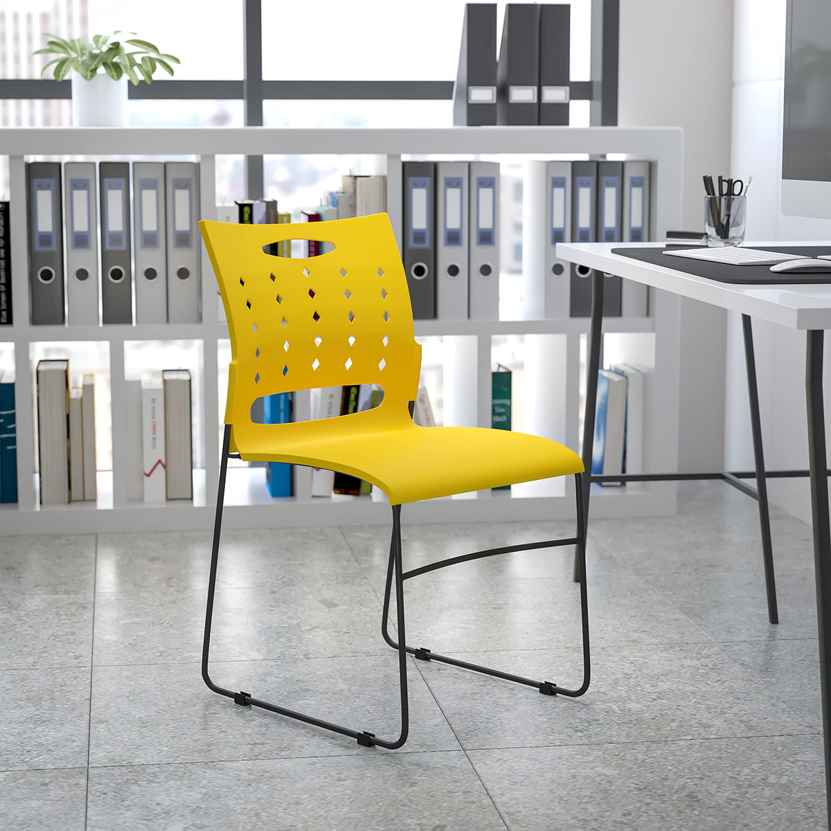881 lb. Capacity Yellow Sled Base Stack Chair with Air