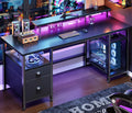 61" Gaming Desk with Outlets & LED, Large Computer Desk, Black | AC Outlets & USB, Ergonomic Monitor Stand, Drawer &